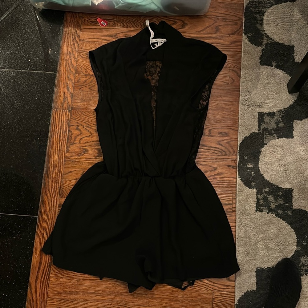 Black lace plunge neck romper size L